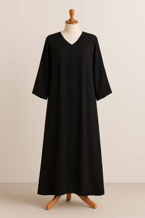 Black Burka with Subtle Beadwork on mannequin