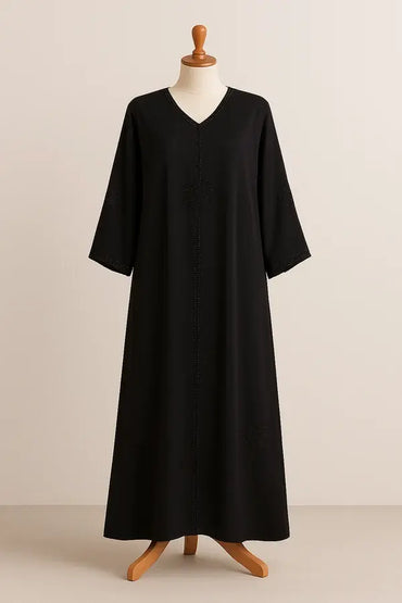 Black Burka with Subtle Beadwork on mannequin