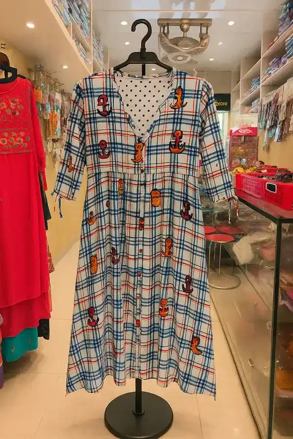 Colorful Check Printed Cotton Kurti displayed on hanger