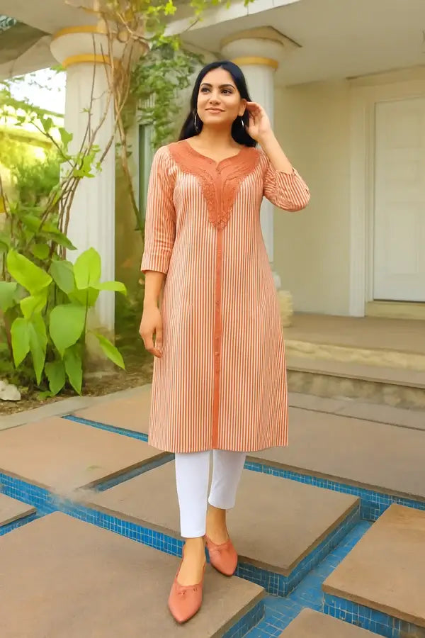 Woman wearing Rustic Elegance Striped Cotton Kurti with white pants